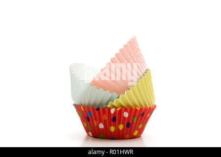 Stacked Multi-Colored Muffin Baking Cups on White Background Horizontal Image Stock Photo
