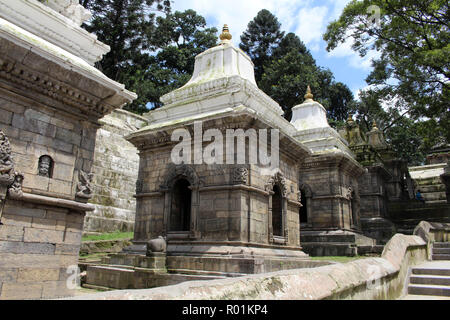 Dozens or hundreds of small temples across Bagmati River of Pashupatinath in Kathmandu. Taken in Nepal, August 2018. Stock Photo