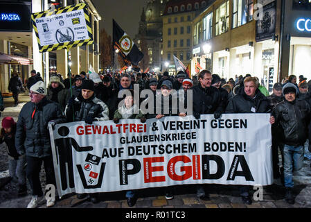 Pegida, Germany. 23rd Jan, 2017. Supporters of Pegida are seen holding a banner during the protest.The Pegida (Patriotic Europeans against the Islamization of the West) weekly protest at the Neumarkt Square. Credit: Omar Marques/SOPA Images/ZUMA Wire/Alamy Live News Stock Photo