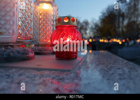 ZACHELMIE, POLAND - OCTOBER 31, 2018: Candles laid on graves in cemetery on the eve of All Saints' Day. Credit: Slawomir Wojcik/Alamy Live News Stock Photo