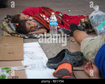 Arriaga, Mexico. 26th Oct, 2018. Migrants rest in Arriaga before making their way on to Oaxaca in the early hours of the morning. Credit: Lexie Harrison-Cripps/Alamy Live News Stock Photo