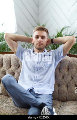 Handsome man in a blue shirt Stock Photo