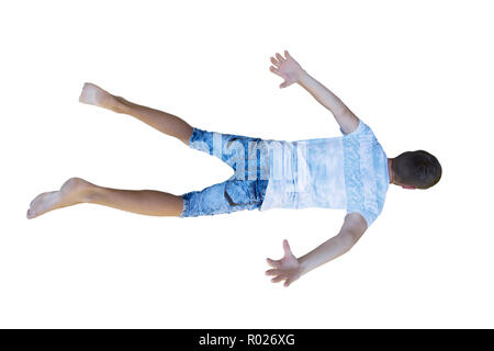 Rear view full length portrait of a young man free falling down hands and legs stretched isolated over white background. Stock Photo