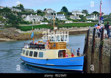 The St. Mawes to Falmouth ferry (named Duchess of Cornwall) arrives at St. Mawes town quay to collect waiting passengers, St.Mawes,Cornwall, UK Stock Photo