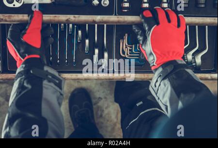 Mechanic Tools Box. Auto Service Worker Looking For Right Tool For. Stock Photo