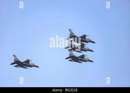 Hellenic Air Force Zeus Demo Team (HAF) F-16C Block 52+ in formation flying over Thessaloniki during the military parade. the 'Oxi day' that commemorates the rejection from Greece of the ultimatum made by Italian dictator Benito Mussolini in 1940. Stock Photo