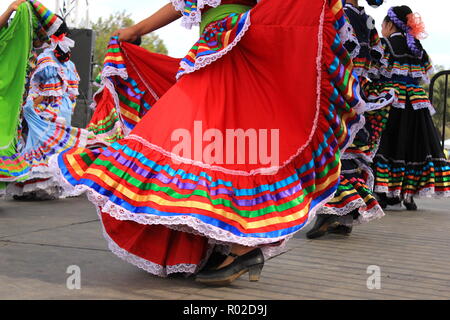 Colorful skirts fly during traditional Mexican dancing Stock Photo - Alamy