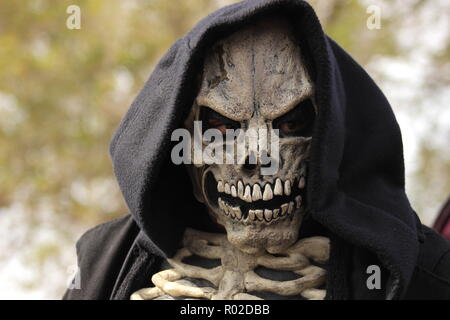 Scary closeup of a Grim Reaper face Stock Photo