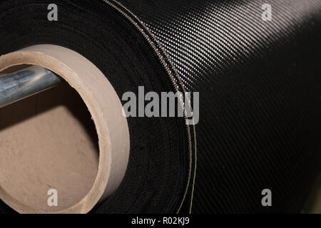 Carbon fiber rolled weave composite material industry Stock Photo