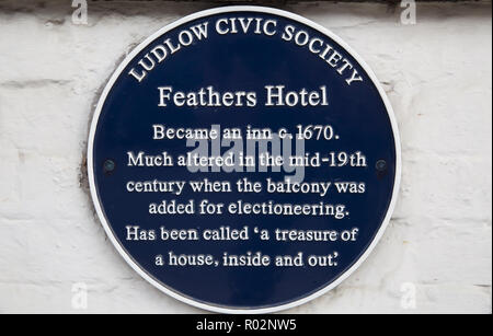 Blue plaque on the wall of the Feathers Hotel in Ludlow Shropshire, UK Stock Photo