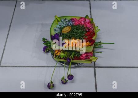 Offering to Hindu Gods in Bali island which called Canang and made from leaves and flowers Stock Photo