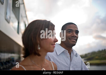 Smiling young man standing next to his partner. Stock Photo
