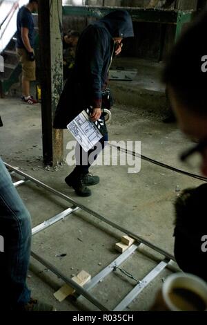 woman holding clapperboard Stock Photo