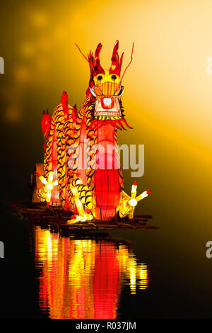 Chinese new year dragon lanterns on pond in china town Stock Photo