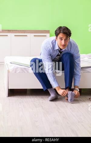 Young businessman employee late for office Stock Photo