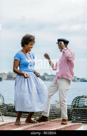Couple enjoys romantic day at seaside. Stock Photo
