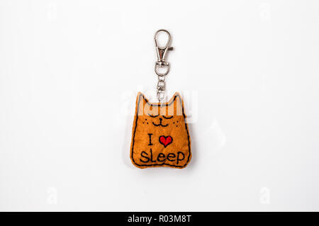 Felt Keychain in shape kitten. Handmade jewelry. Stock Photo