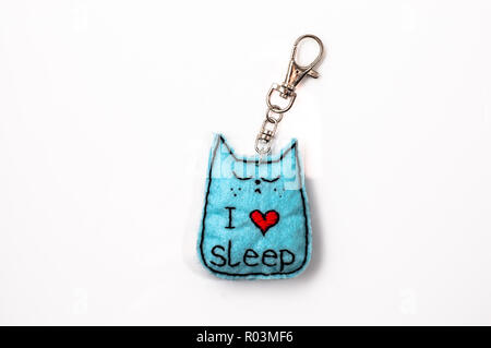 Felt Keychain in shape kitten. Handmade jewelry. Stock Photo