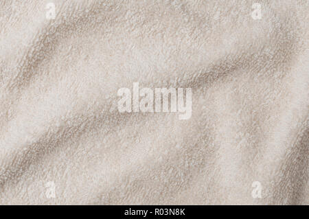 Fluffy clear brown towel top view, texture background Stock Photo