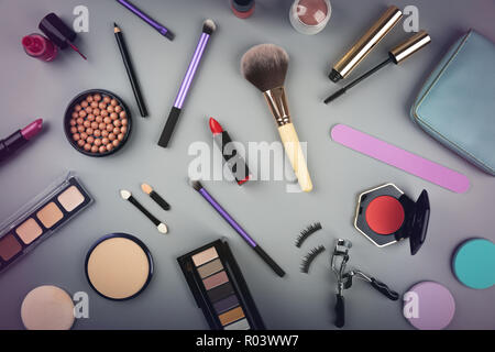 makeup artist cosmetics set on gray background. top view Stock Photo