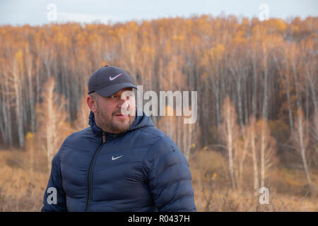 Funny man with a beard. A guy in a cap with a beard Stock Photo