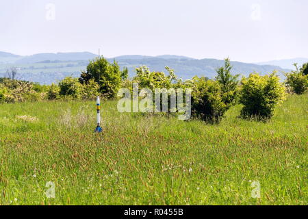 Rocket model prepare for takeoff launch, summer sunny day Stock Photo