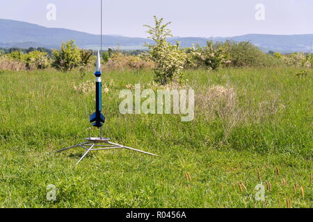 Rocket model prepare for takeoff launch, summer sunny day Stock Photo