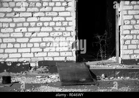 The war in Ukraine. Settlement Shyrokyne, Donetsk region. September 2018. Buildings destroyed as a result of military actions of the Russian invaders  Stock Photo