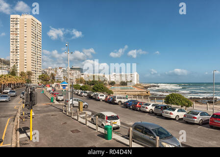 CAPE TOWN, SOUTH AFRICA, AUGUST 17, 2018: A view of Beach Road and Sea Point in Cape Town in the Western Cape Province. The Atlantic Ocean, buildings  Stock Photo