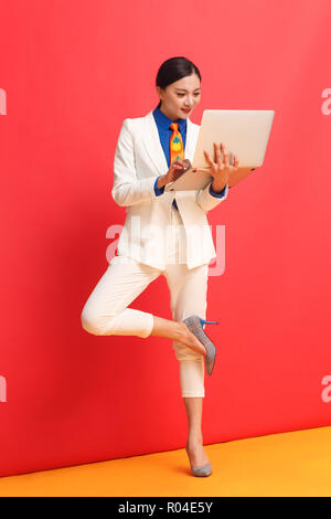 Young women using laptops Stock Photo