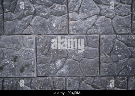 Close-up of gray wall of large stone slabs. Stock Photo