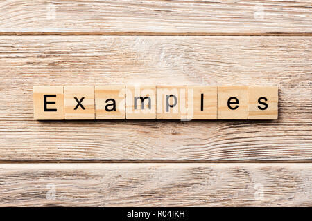 examples word written on wood block. examples text on table, concept. Stock Photo