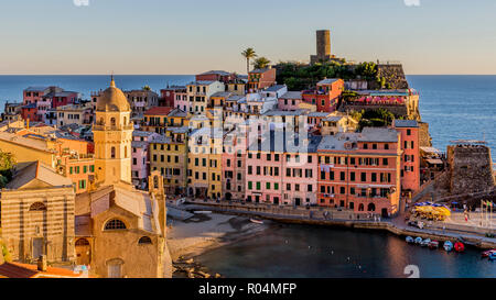 The historic center of Vernazza illuminated by the setting sun, Cinque Terre, Liguria, Italy Stock Photo