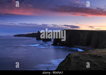 Amazing rock formations called Duncansby Stacks - northern Scotland, John o'Groats area, summer evening trip. Stock Photo