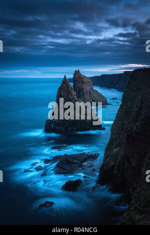 Amazing rock formations called Duncansby Stacks - northern Scotland, John o'Groats area, summer evening trip. Stock Photo