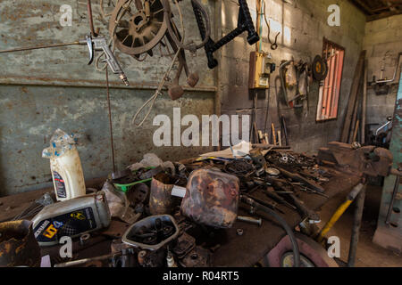 Tools and vehicles parts in a mechanical turner workshop Stock Photo