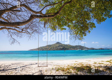 Looking across to Carriacou, Grenada, Petit St. Vincent, The Grenadines, St. Vincent and The Grenadines, West Indies, Caribbean, Central America Stock Photo