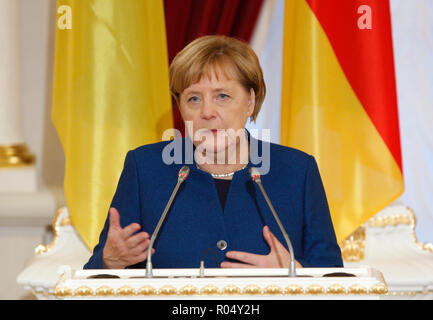 German Chancellor Angela Merkel speaks during a press conference with Ukrainian President Petro Poroshenko after their meeting in Kiev.  German Chancellor Angela Merkel travelled to the Ukrainian capital Kiev for talks the situation at eastern Ukraine, and about the Crimea, annexed by Russia. And also for discuss the strengthening of trade and economic and investment cooperation between Germany and Ukraine. Stock Photo