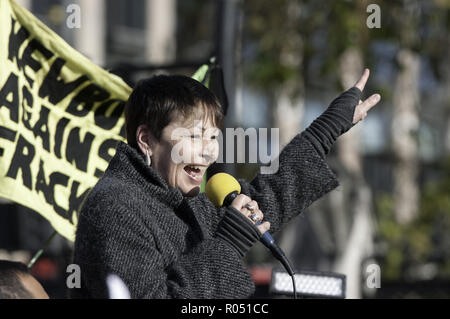 London, Greater London, UK. 31st Oct, 2018. Green party member of Parliament Caroline Lucas seen speaking during the protest.The newly formed Extinction Rebellion group, concerned about climate change, calls for a peaceful mass civil disobedience to highlight politicians' lack of commitment and action regarding environmental issues. Activists gathered at the Parliament Square and blocked the road for two hour. The protest included speakers such as Greta Thunberg, Caroline Lucas, and George Monbiot. According to Extinction Rebellion 15 people were arrested in the protest. (Cr Stock Photo