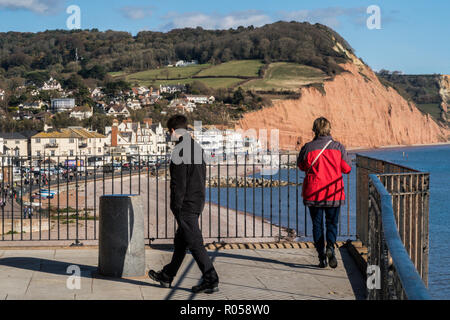 Sidmouth, Devon. 2nd Nov 2018. UK Weather: People take in the view of Sidmouth seafront from Connaught Gardens above the town. Photo Central/Alamy Live News Stock Photo