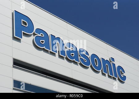 01 November 2018, Japan, Fukuoka: Logo of the Japanese electronics company Panasonic on a factory building . The Group manufactures surveillance cameras and smaller electronic devices here, among other things. After a major crisis in 2011 and 2012, Panasonic has caught its breath again and is working on various renewal initiatives. Photo: Christoph Dernbach/dpa Stock Photo