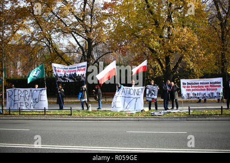 Warsaw, Poland, 2nd November 2018: Far right activists protest in demand on reperations for demages caused by German army at World War 2 during the official visit of German government to Poland. ©Madeleine Ratz/Alamy Live News Stock Photo