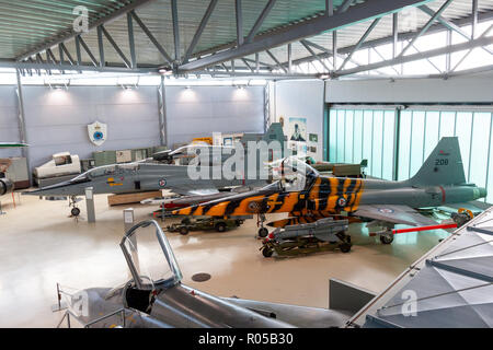 OSLO, NORWAY - JUL 16, 2011: Royal Norwegian Air Force F-5 Tiger fighter jets on display in the Norwegian Armed Forces Museum at Oslo-Gardermoen airpo