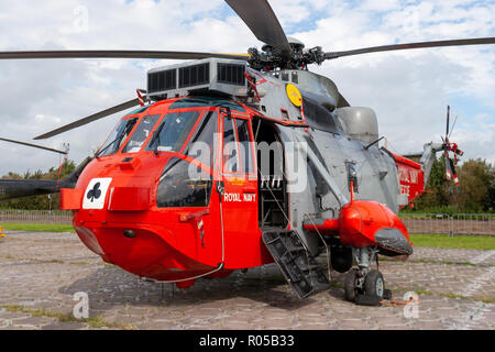 LEEUWARDEN, NETHERLANDS - SEP 17, 2011: British Royal Navy Sea King search and rescue helicopter from 771 Naval Air Squadron idle on Leeuwarden airbas Stock Photo