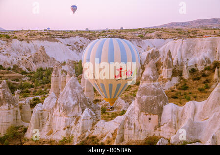 Cappadocia - Turkey - August 2018: Hot air balloon fly at sunrise . Stock Photo
