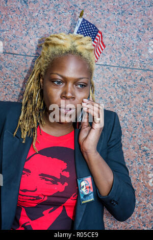 Miami Florida,Adrienne Arsht Center,2009 Presidential Inauguration Simulcast,Barack Obama,historical celebration,Black woman female women,tee shirt,la Stock Photo