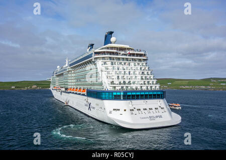 Celebrity Eclipse Valletta, Solstice-class cruise ship operated by Celebrity Cruises departing Lerwick harbour, Shetland Islands, Scotland, UK Stock Photo