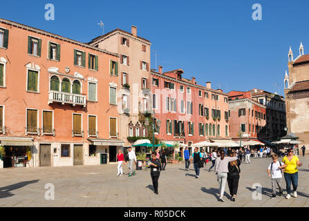 Tourists in Campo Santo Stefano, Venice, Italy Stock Photo