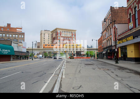 DETROIT, MICHIGAN, UNITED STATES - MAY 22nd, 2018: Detoit People Mover crosses a street in Greektown. The elevated monorail is one of many public modes of transportation in the city Stock Photo