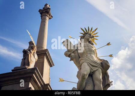 Saint Sebastian shot with arrows martyr statue, Marian plague column of Saint Rosalia, Velehrad Monastery, Moravia, Czech Republic, sunny day clear bl Stock Photo